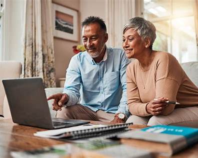 https://www.ambetterhealth.com/content/dam/centene/Centene%20Corporate/web-images/ambetter/knowledge-center/elderly-couple-reviewing-health-insurance-on-laptop.jpg?utm_source=chatgpt.com